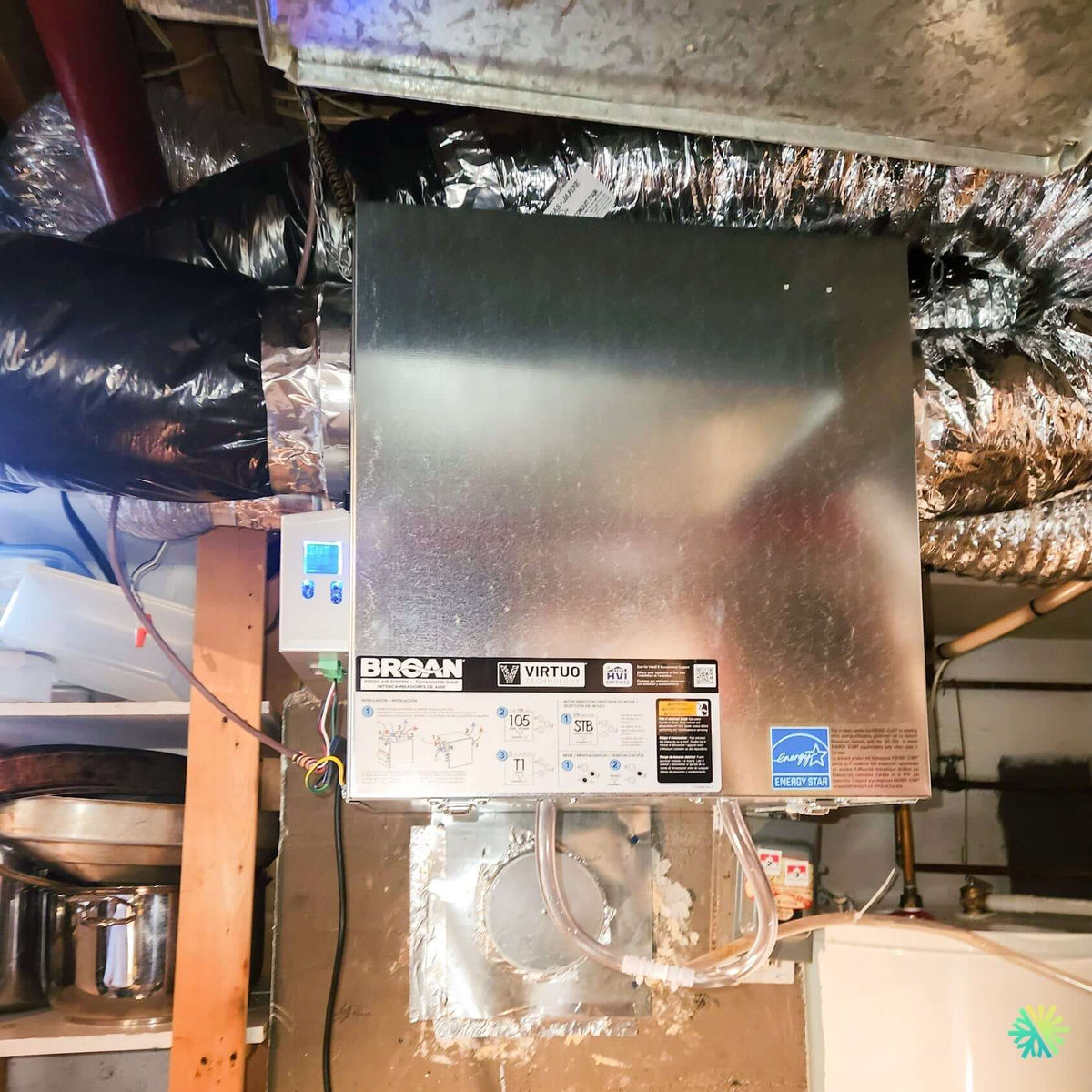Installation of a Broan-NuTone AI Series V180H75RT air exchanger in Baie-D'Urfé