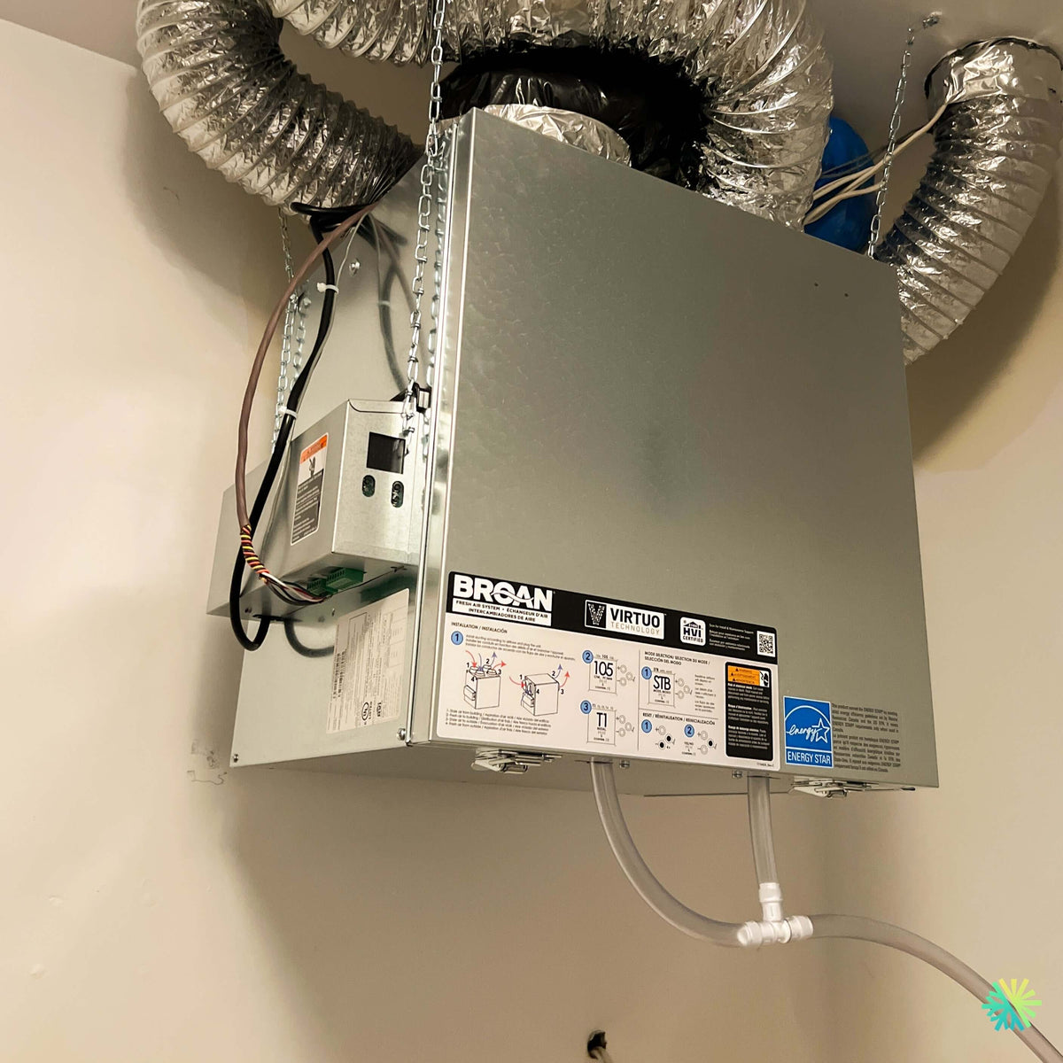 Installation d'un échangeur d'air Broan-NuTone Virtuo Technology réglé à 105 PCM dans un plex d'Ahuntsic-Cartierville, à Montréal