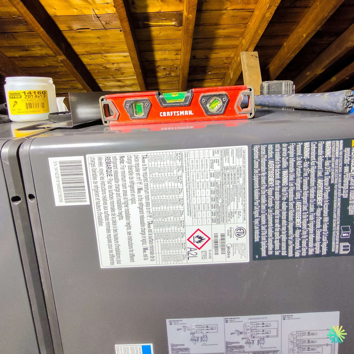 Installation d’une fournaise électrique MIDEA EVOX G3 2 tonnes à Saint-Bruno — système central avec air handler pour confort quatre saisons
