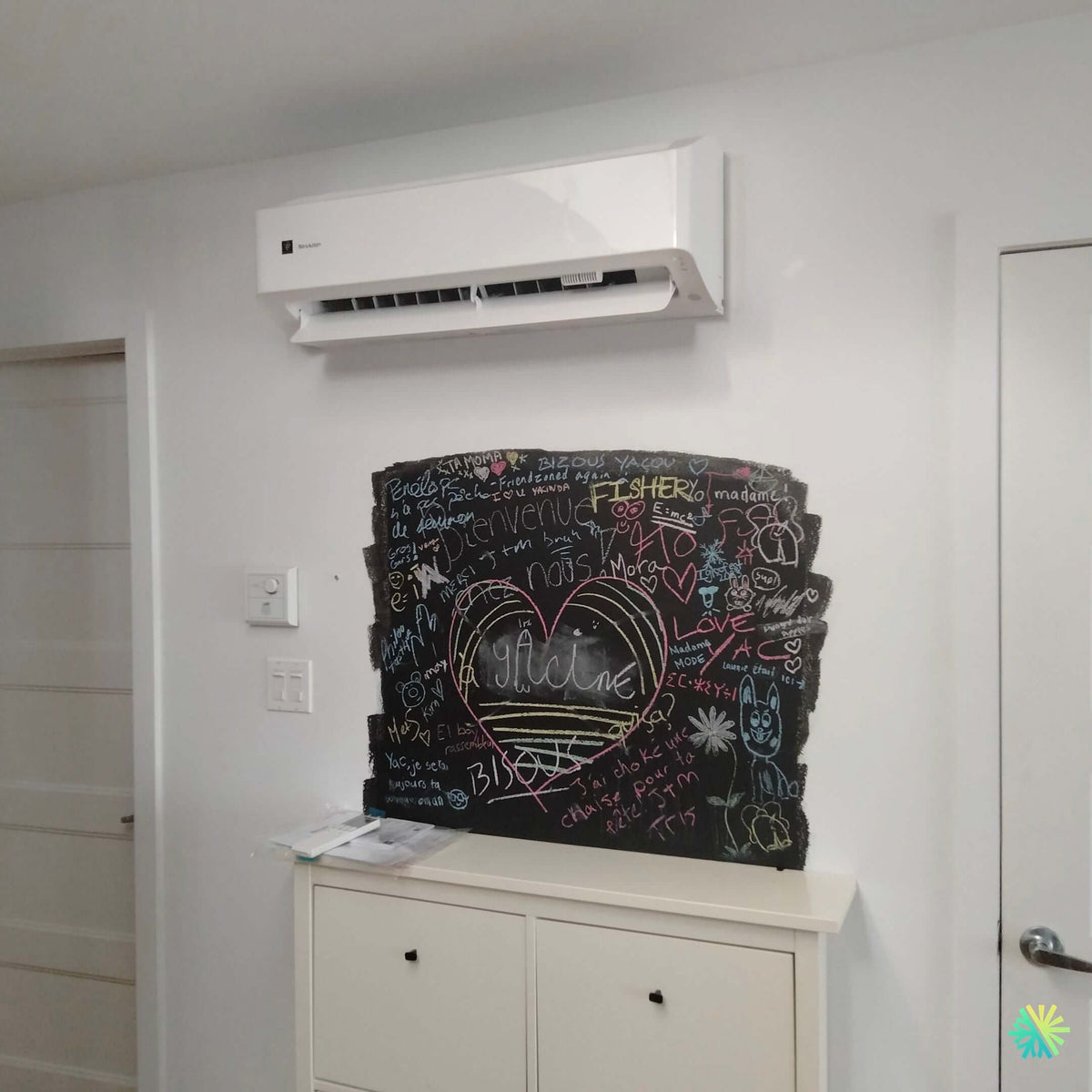 Installation of a Sharp ZU1 wall-mounted heat pump in Villeray