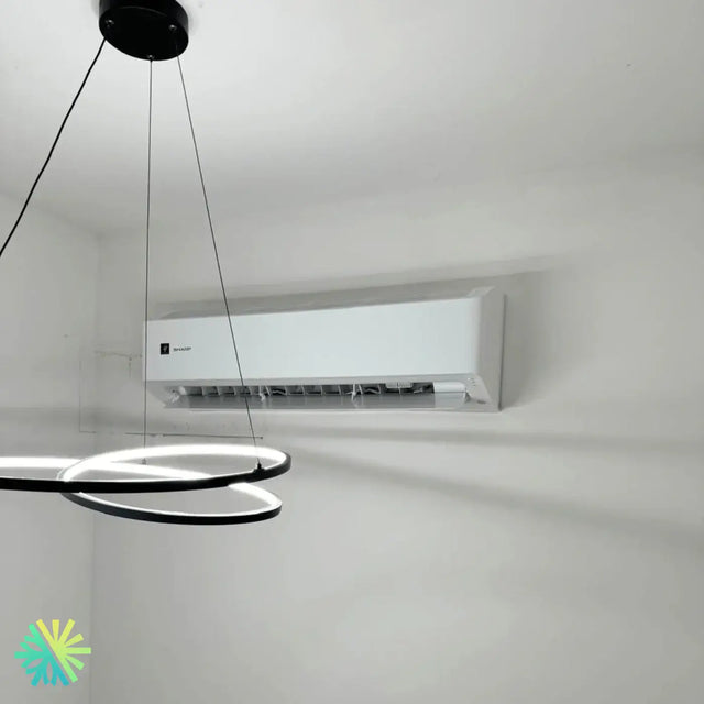 Installation of a Sharp ZU1 wall-mounted heat pump in Saint-Lambert