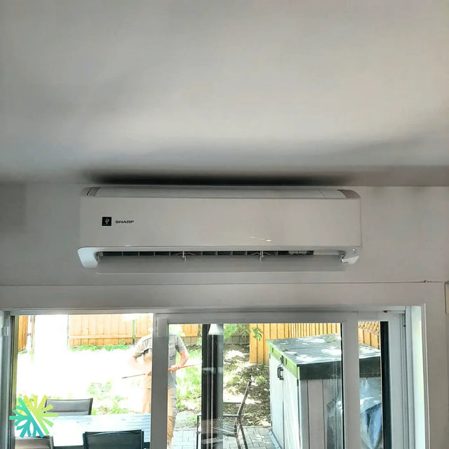 Installation of a Sharp ZU1 wall-mounted heat pump in Varennes