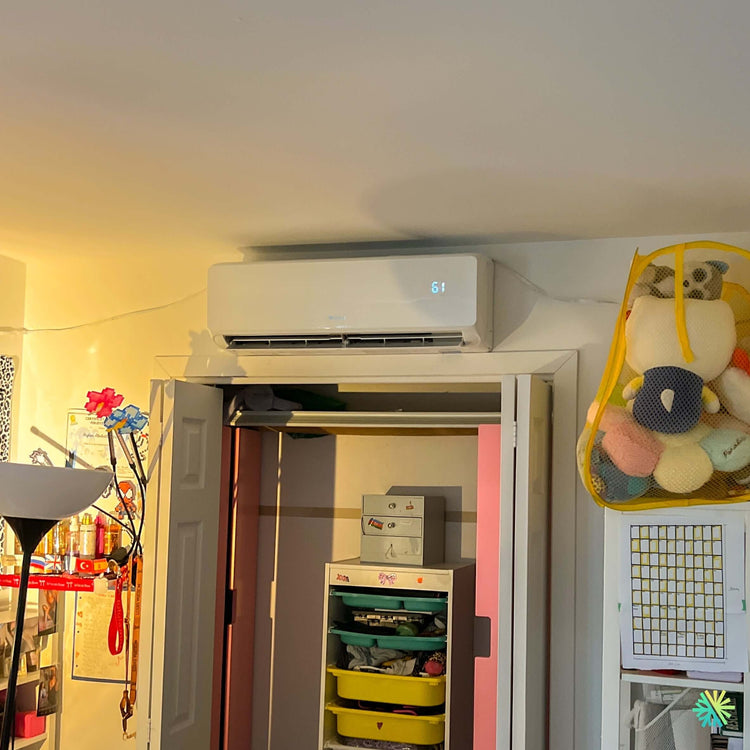 Installation d'une thermopompe murale 2 têtes GREE FreeMatch R32 (GWHD(18)ND6MO) à Baie-D'Urfé, agglomération de Montréal