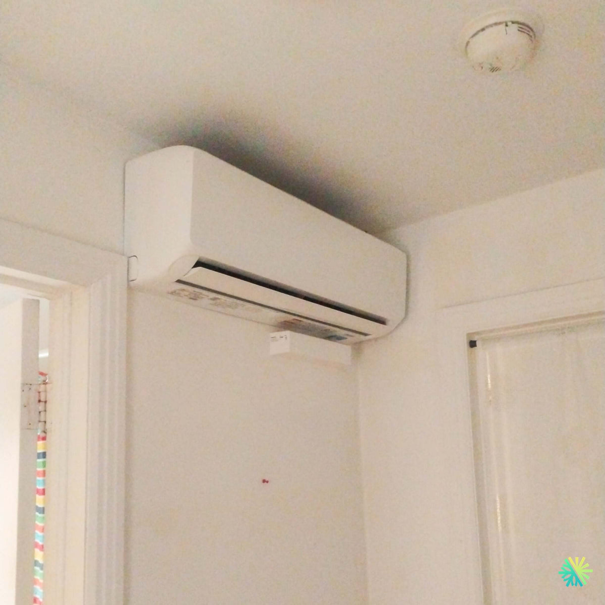 Installation d'une thermopompe murale 2 têtes GREE FreeMatch R32 (GWHD(24)ND6MO) dans l'arrondissement de Montréal-Nord