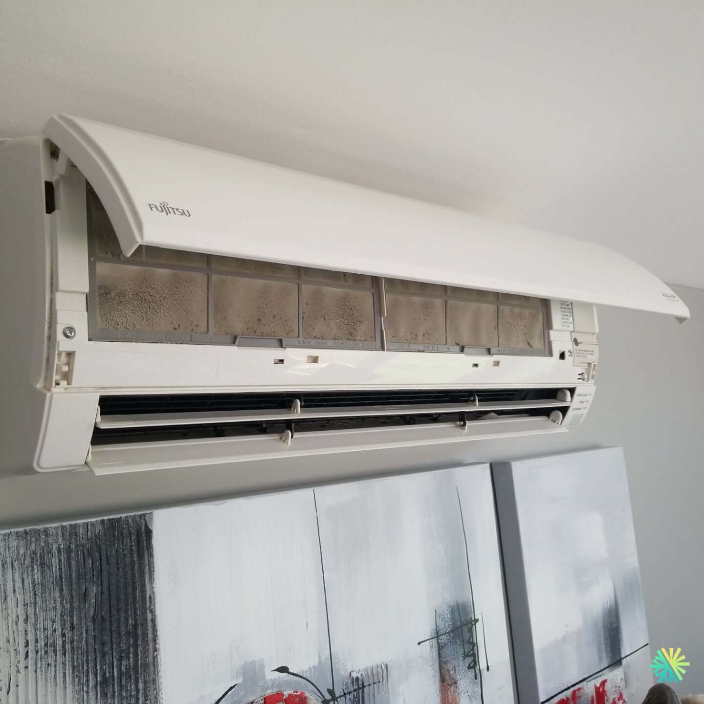 Nettoyage d’une thermopompe murale Fujitsu à Sainte-Thérèse