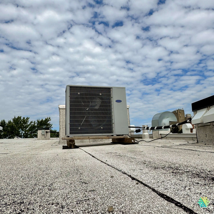 Réparation d’une thermopompe centrale Carrier à l’Île-des-Sœurs