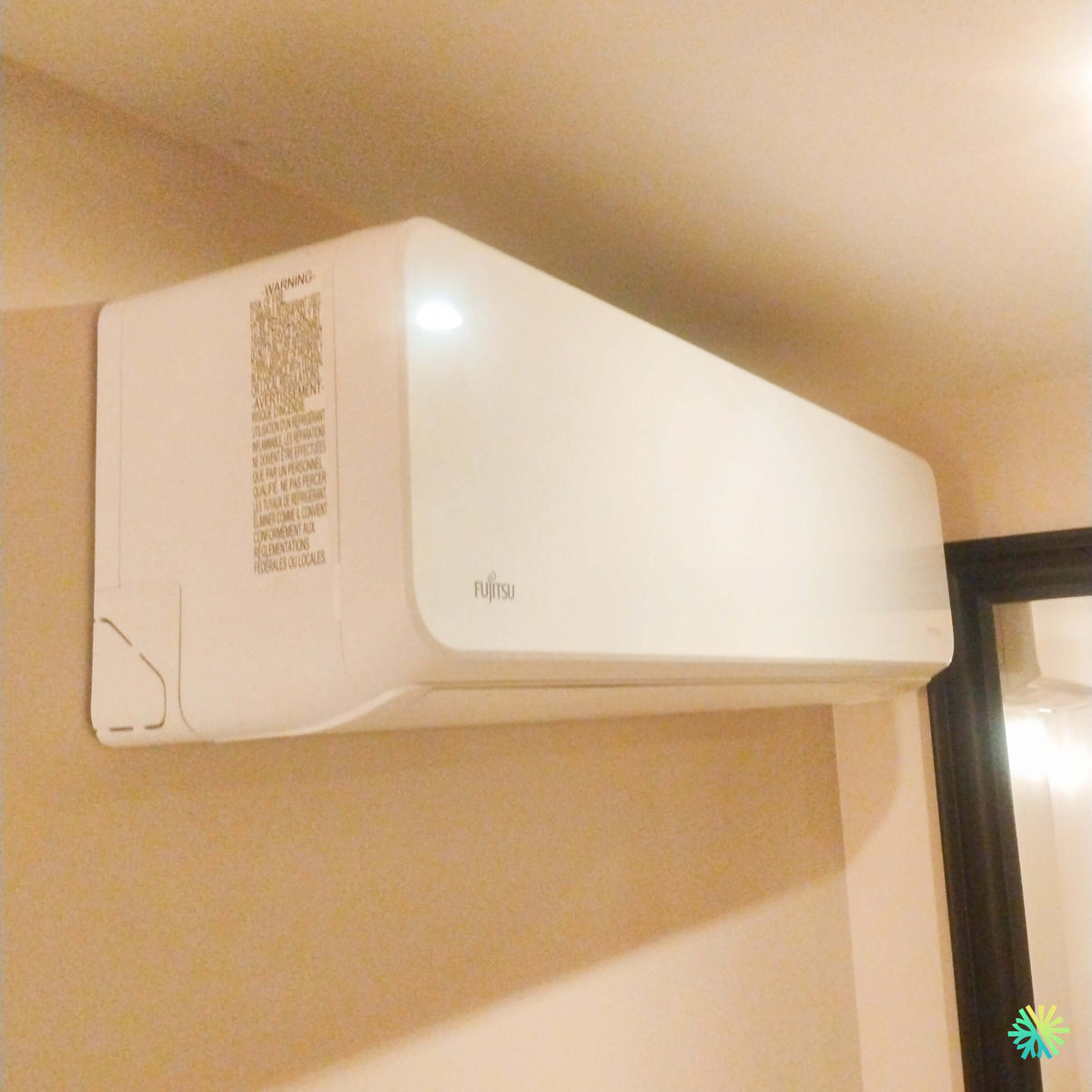 Installation d’une thermopompe murale Fujitsu AIRSTAGE Altair 500 à Sainte-Julie : une intégration intérieure compacte, près du plafond et pensée pour le confort