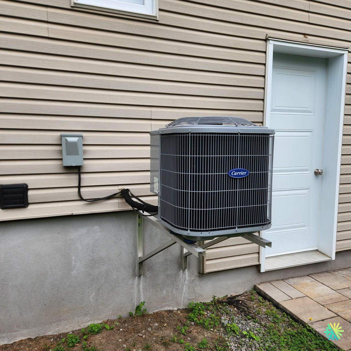 Installation d’une Carrier thermopompe centrale à Saint-Laurent