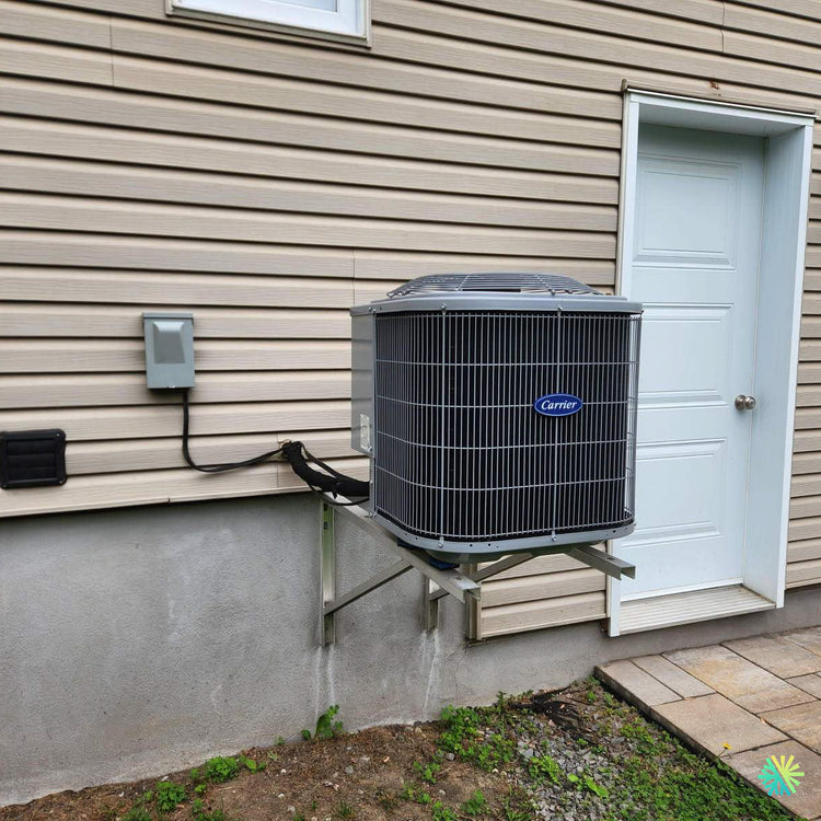 Installation d’une Carrier thermopompe centrale à Saint-Laurent