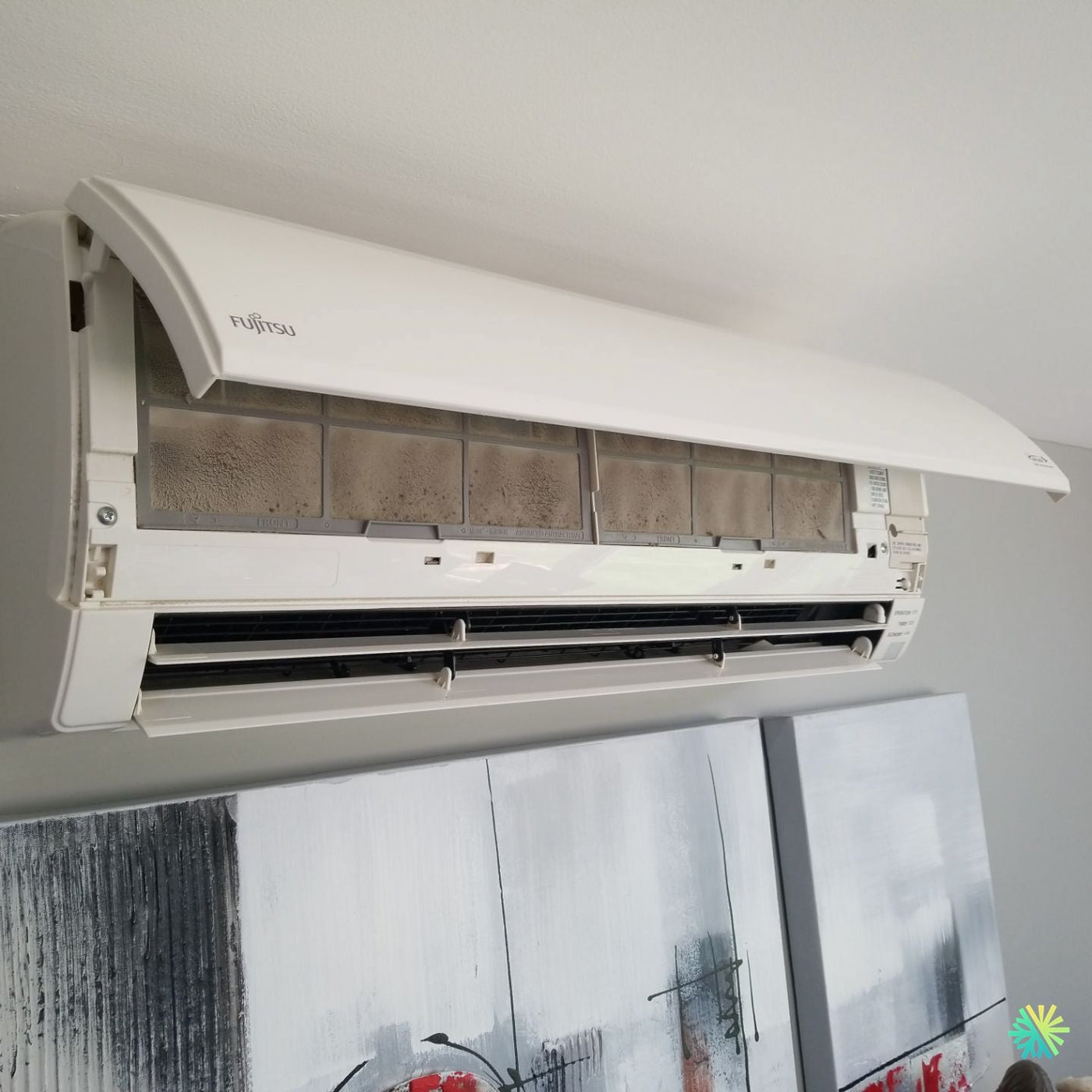 Nettoyage d’une thermopompe murale Fujitsu à Sainte-Thérèse