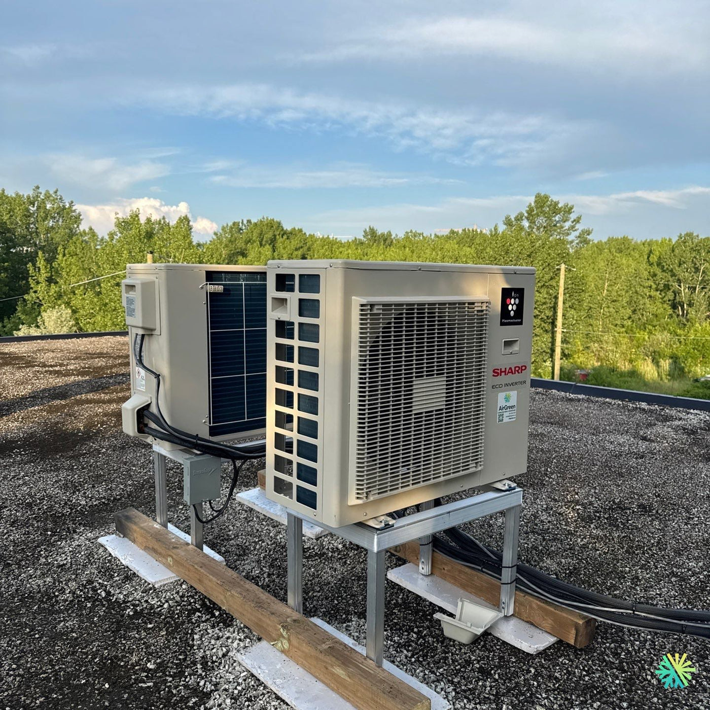 Installation d’une Sharp BU série Eco Inverter sur toit plat à Laval