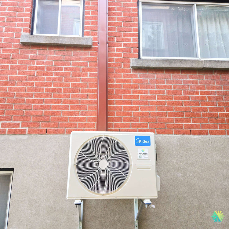 Installation d’une thermopompe double zone MIDEA MIDEA28 à Kirkland avec 2 têtes intérieures et 1 unité extérieure