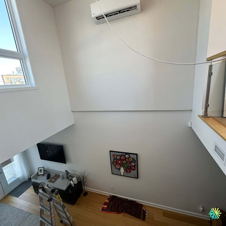 Installation d’une thermopompe murale Gree dans un condo à Ville-Marie