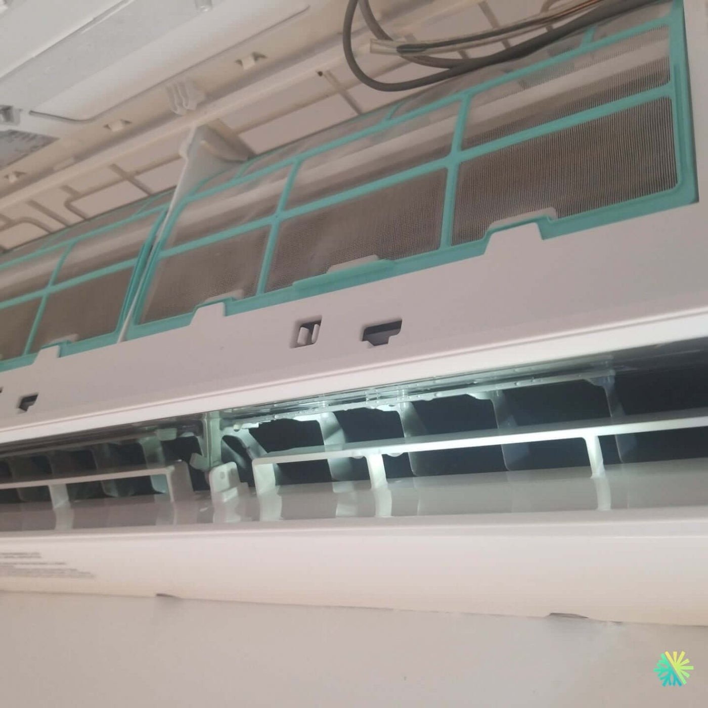 Réparation d’une thermopompe murale Gree à Saint-Lambert