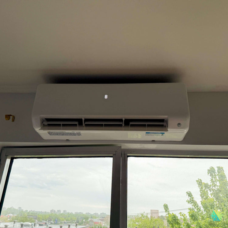 Installation d’une thermopompe murale MIDEA MIDEA35 à Sainte-Clotilde
