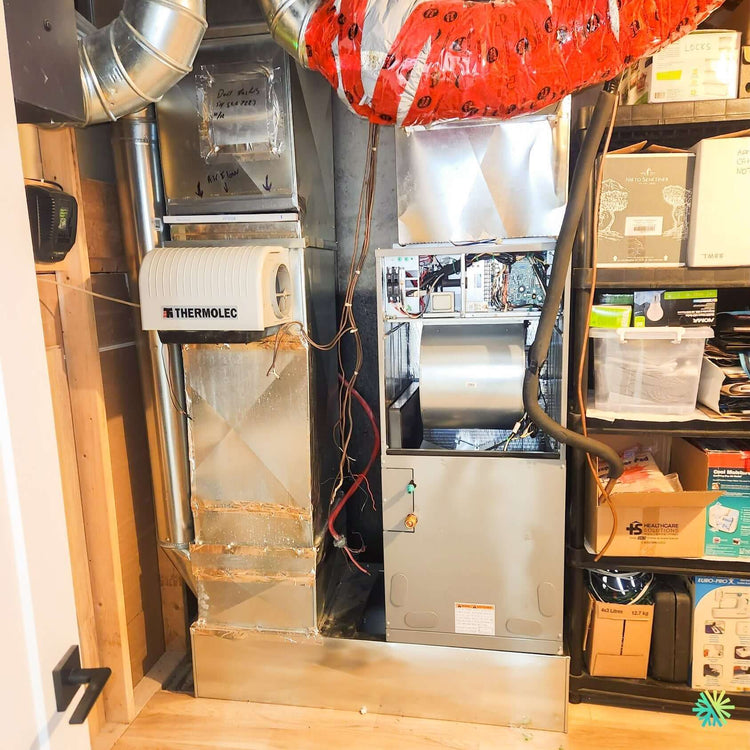 Installation d'une thermopompe centrale GREE UNIX R32 avec appoint de chauffage électrique Thermolec à Carignan (MRC de La Vallée-du-Richelieu)