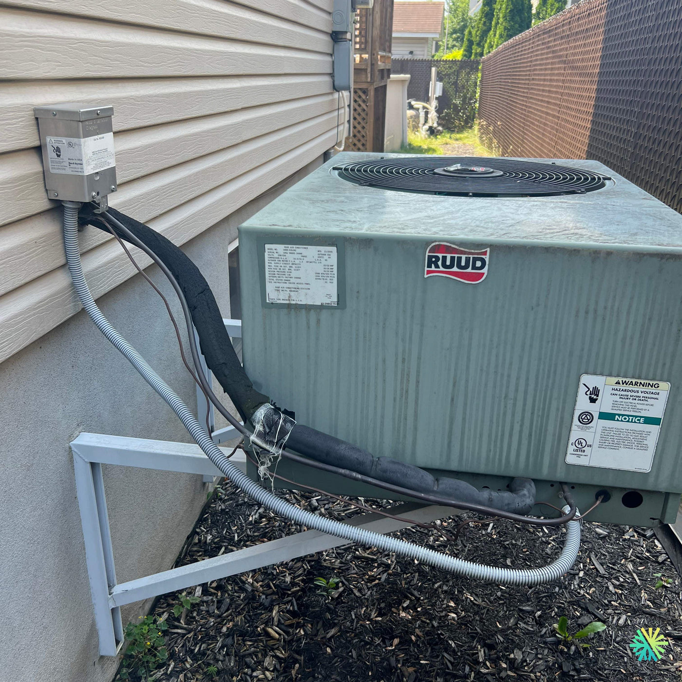 Nettoyage d’une thermopompe centrale RUUD à Saint-Lambert