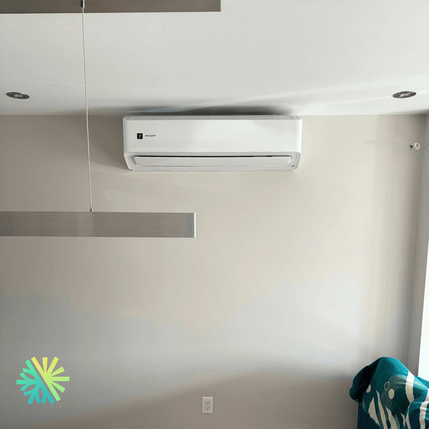 Installation d'une thermopompe triple zone SHARP BU à Île-des-Sœurs, Nun's Island