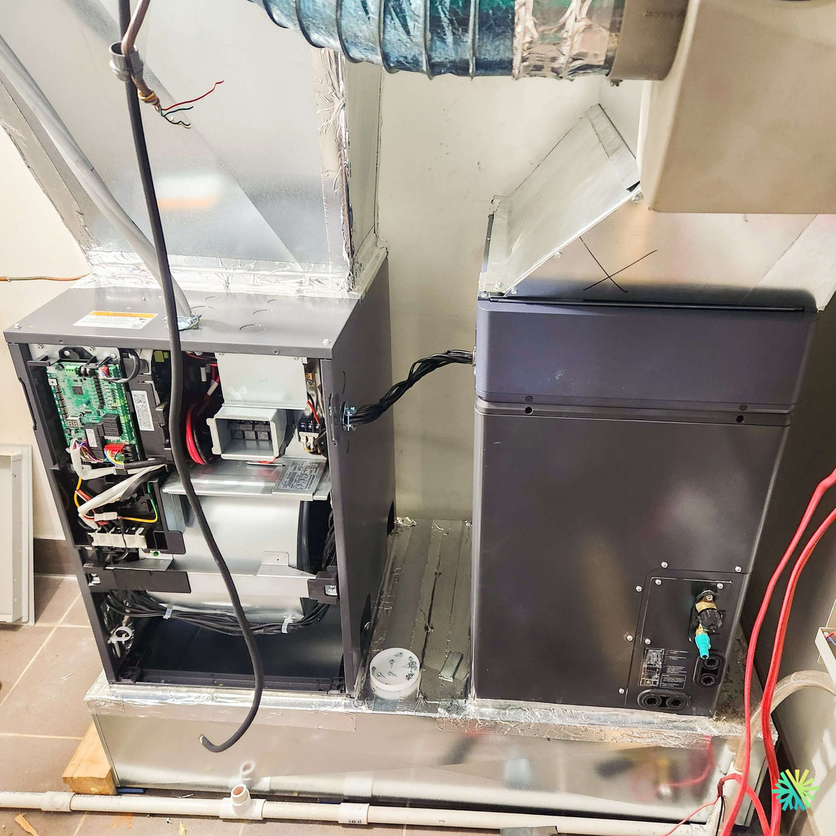 Installation d’une fournaise électrique MIDEA EVOX G3 en configuration low-boy à Repentigny, Lanaudière