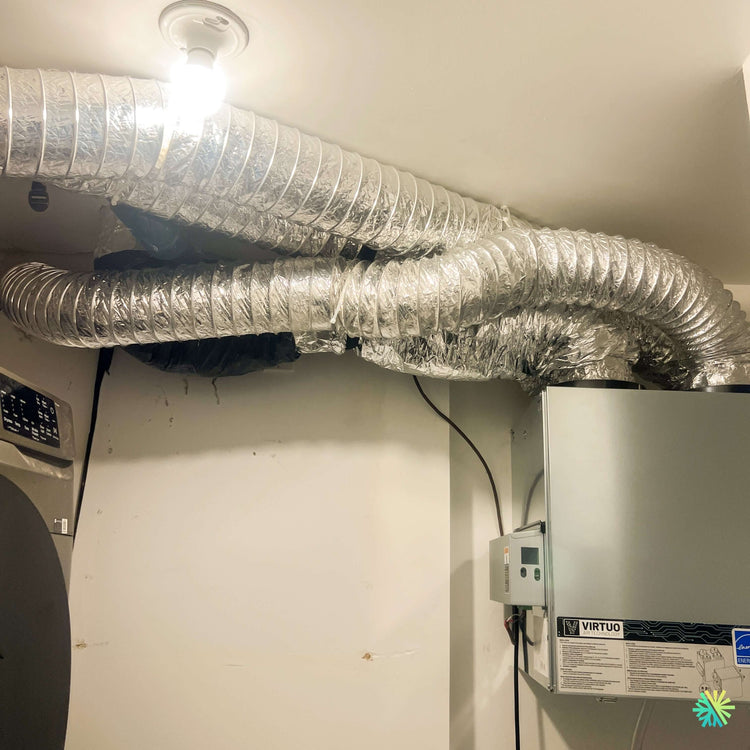 Installation d'un échangeur d'air vänEE AI Series V160H80RT à Saint-Anicet, en bordure du lac Saint-François