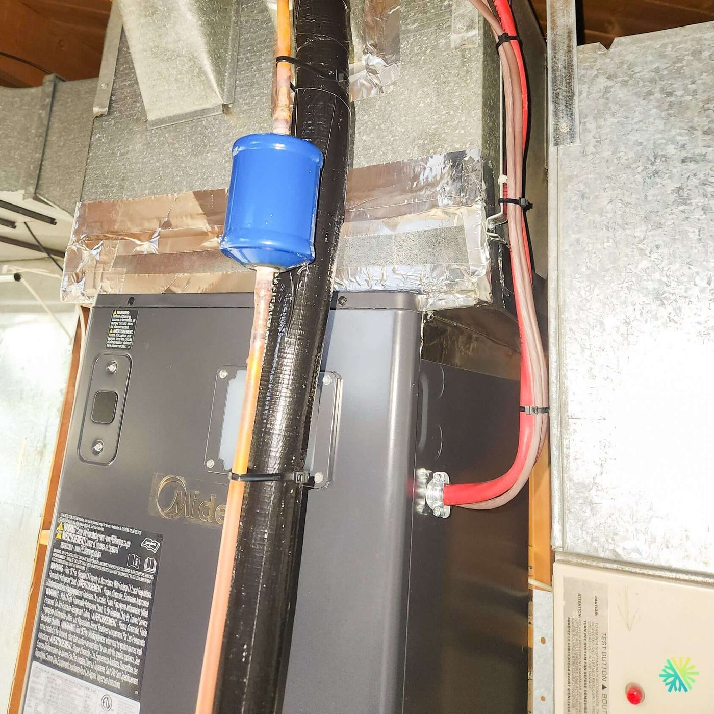 Installation d’une fournaise électrique MIDEA EVOX G3 – 3 tonnes avec système central Air Handler à Laval-des-Rapides