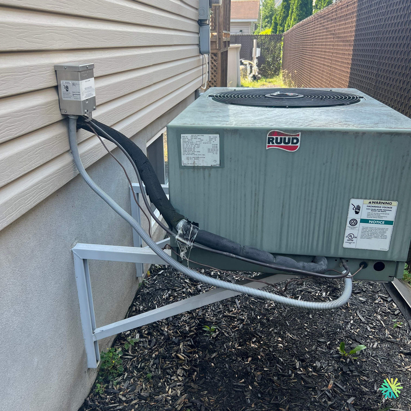 Nettoyage d’une thermopompe centrale RUUD à Sainte-Dorothée