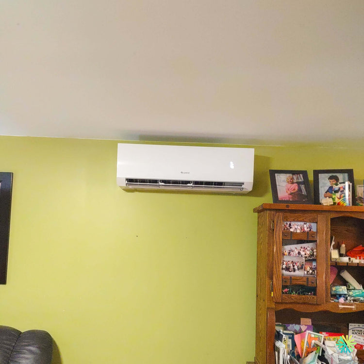 Installation d’une thermopompe murale GREE CLIVIA R32 à Sainte-Thérèse : mini split résidentiel installé avec précision par AirGreen