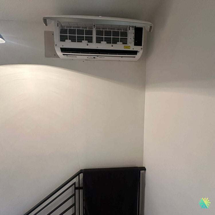 Réparation d’un système plafond Midea à Saint-Lambert