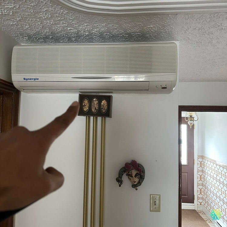 Réparation d’un climatiseur mural Synergie à Sainte-Thérèse