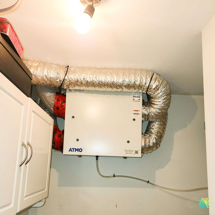 Installation d'un échangeur d'air FANTECH ATMO 150H dans l'arrondissement de Montréal-Nord