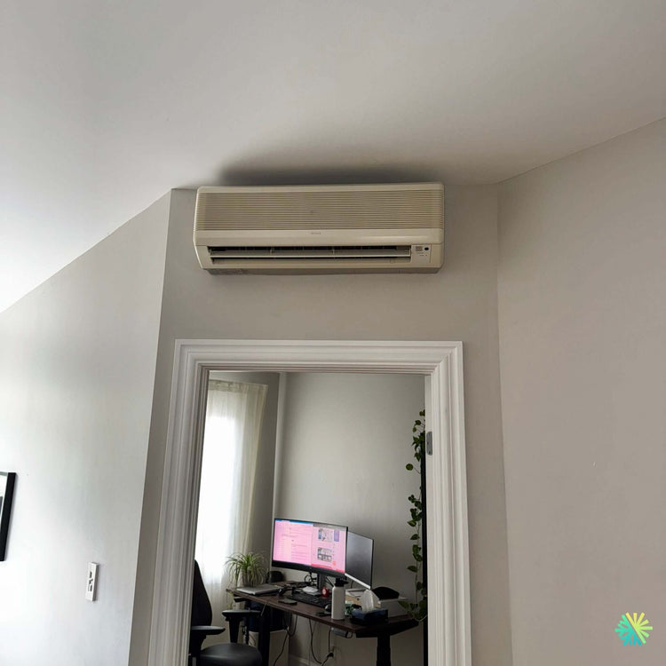 Réparation d’un climatiseur mural Sharp à Saint-Laurent