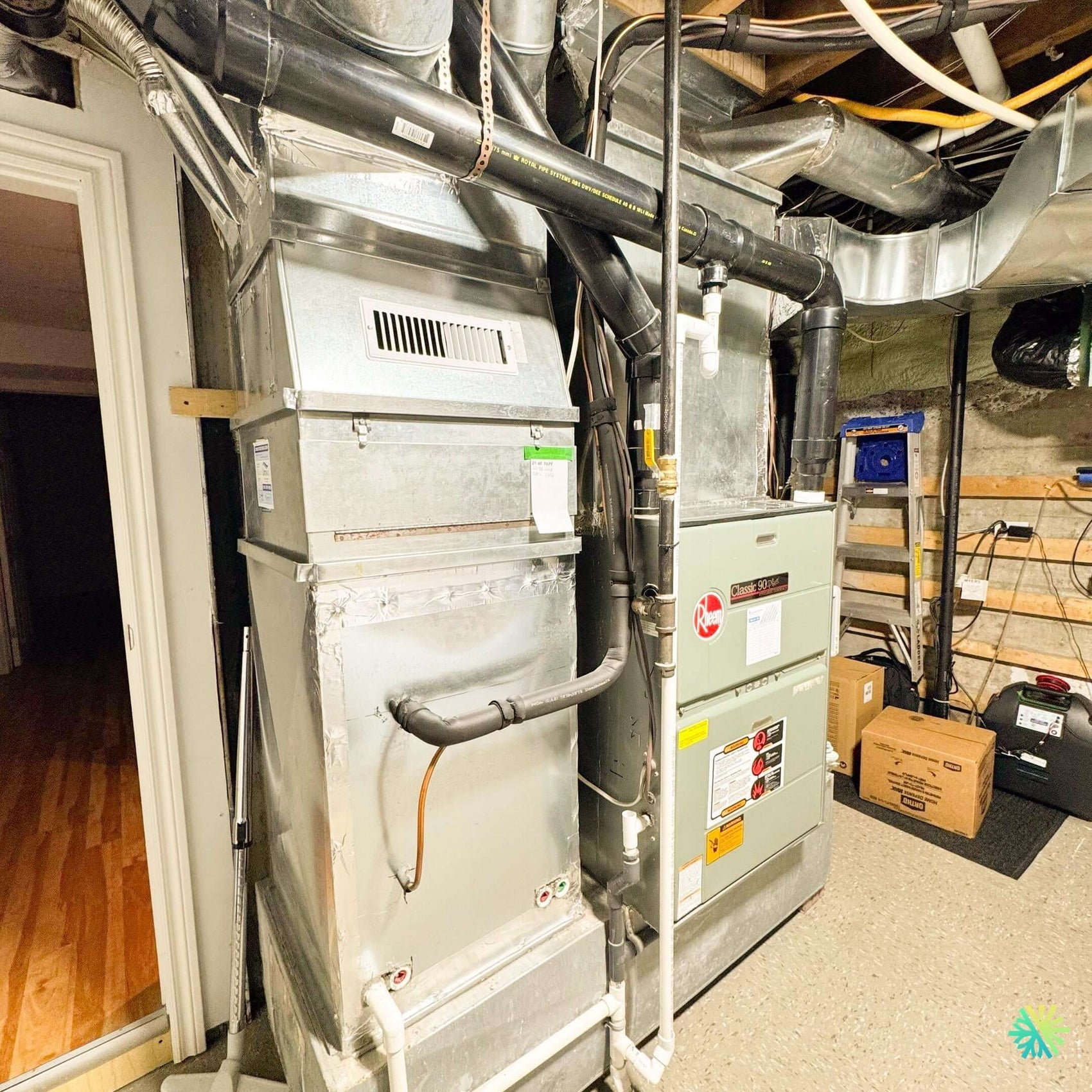 Réparation d’un Système de Thermopompe Centrale à Baie-D'Urfé : Intervention d'AirGreen pour un Air Handler Rheem