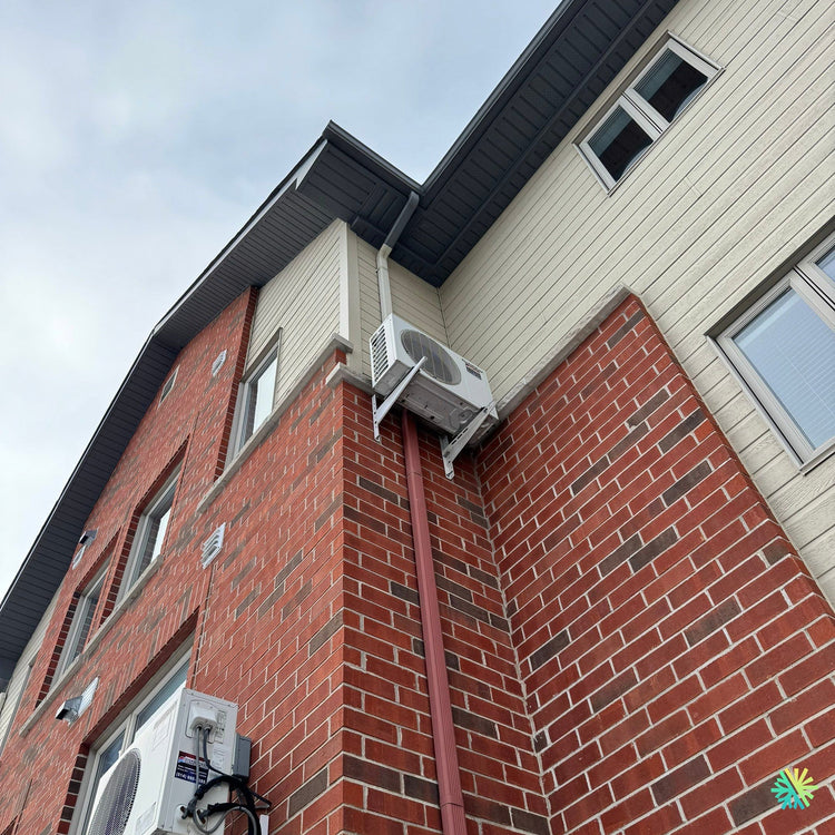 Installation d’une thermopompe murale Midea à Sainte-Dorothée