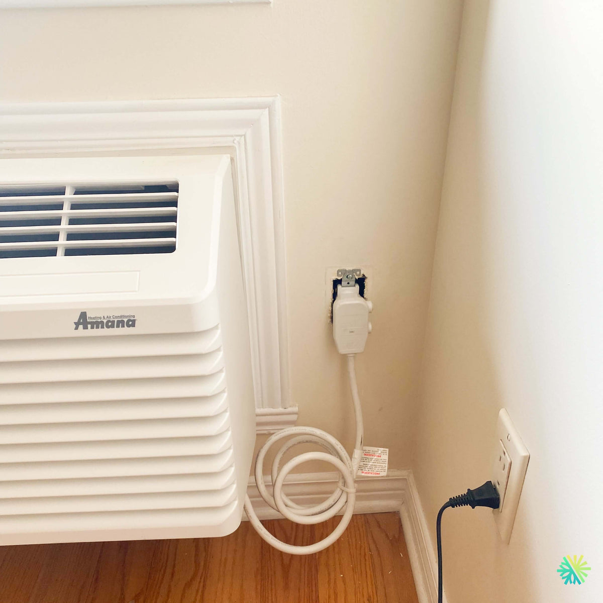 Installation d’un AMANA PTAC encastré sous une fenêtre à Châteauguay