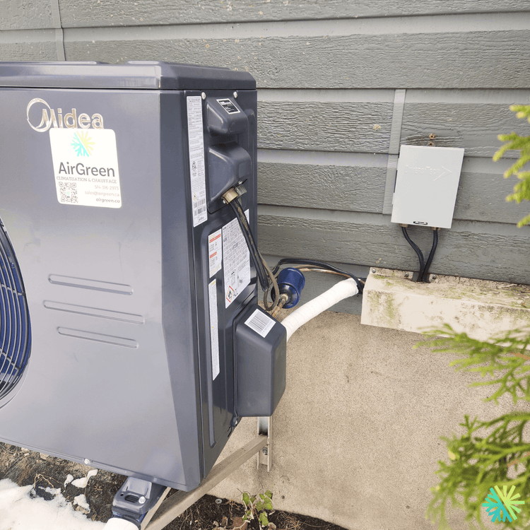 Installation d’une thermopompe murale Midea à Sainte-Rose (Laval)