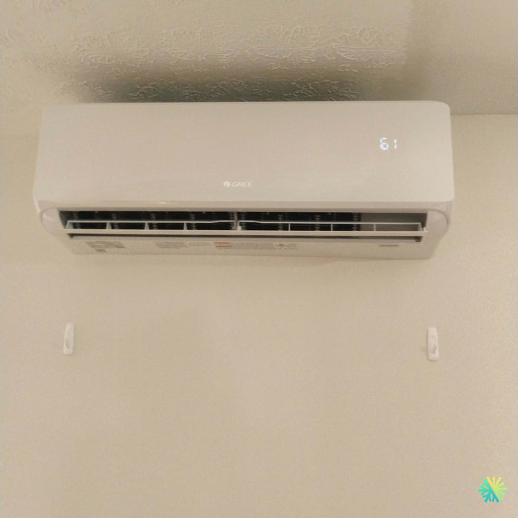 Installation d'une thermopompe murale 2 têtes GREE FreeMatch R32 à Saint-Robert, MRC de Pierre-De Saurel (Montérégie)