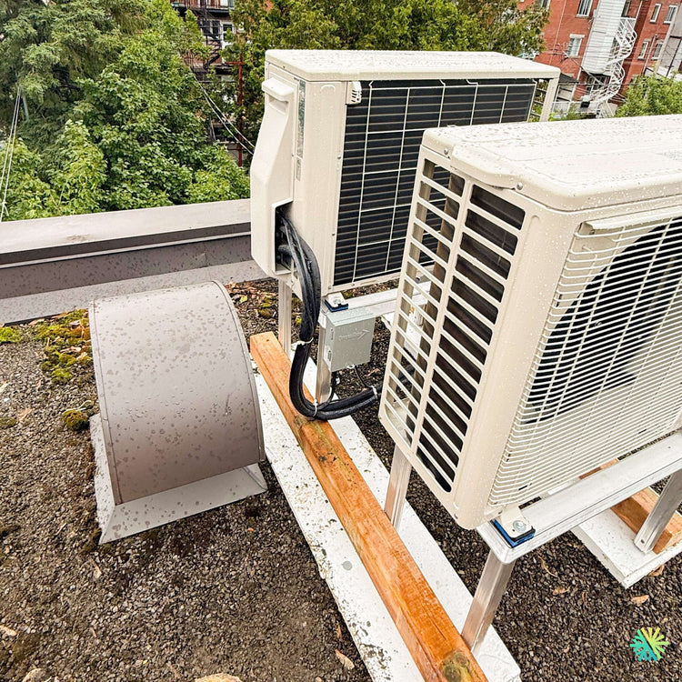 Installation d’une thermopompe murale Fujitsu AIRSTAGE Altair 700 sur toit plat à Coteau-du-Lac