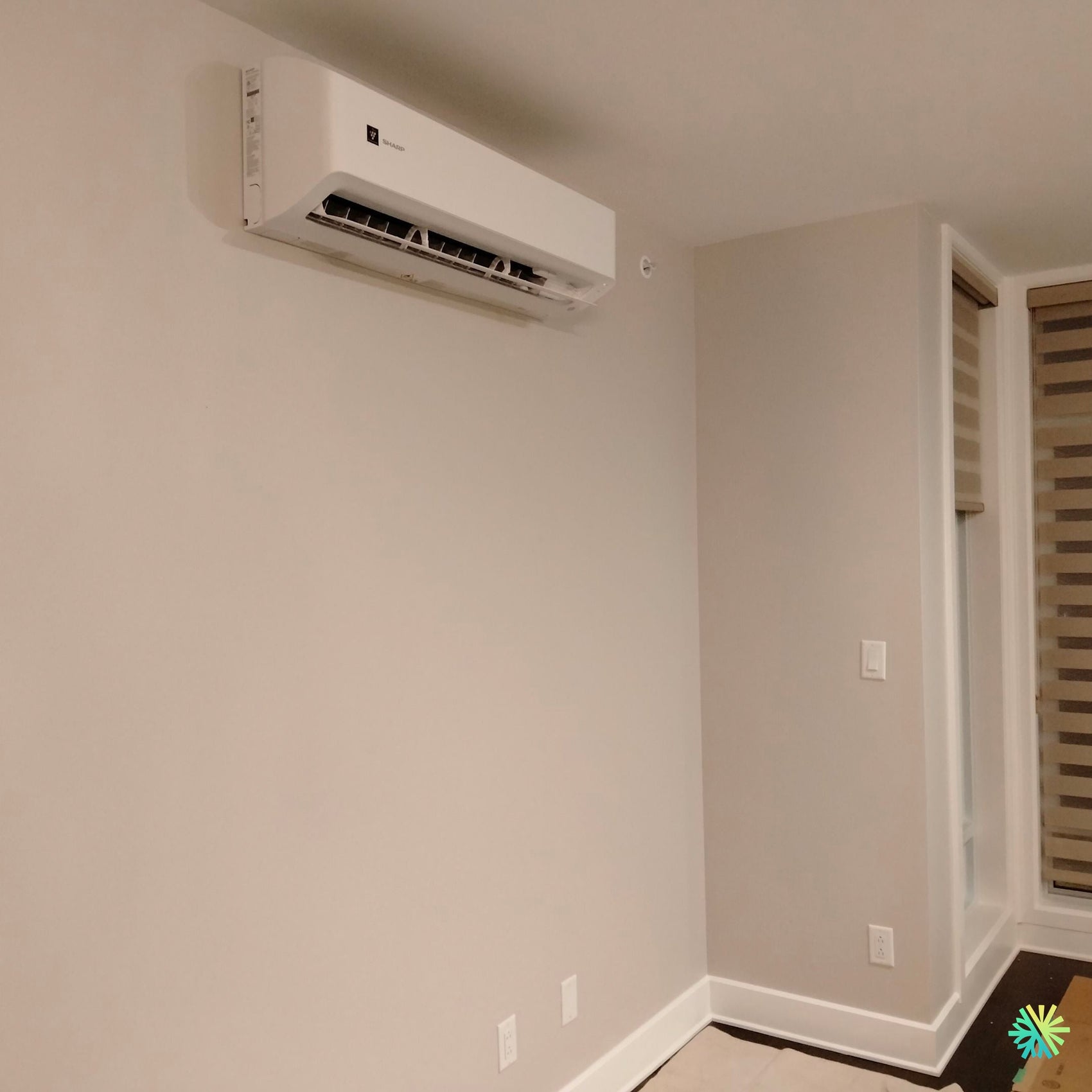 Réparation d’un climatiseur mural Sharp à Saint-Lambert