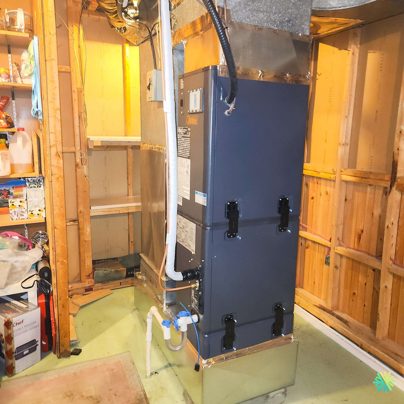 Installation d’une fournaise électrique MIDEA EVOX G3 4 tonnes avec système central Air Handler à Westmount
