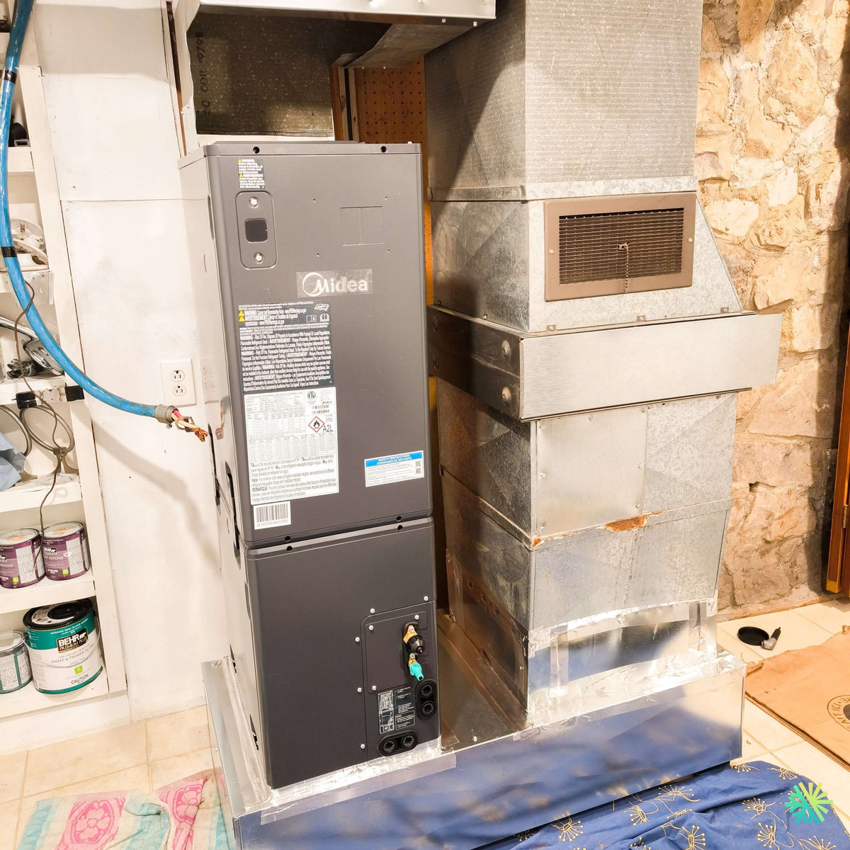 Installation d’une fournaise électrique MIDEA EVOX G3 dans Ville-Marie, Montréal : intégration sur mesure au réseau de conduits existant