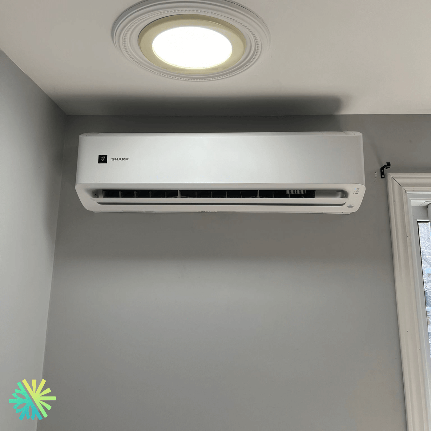 Installation d'une thermopompe murale Sharp ZU1 à Laval