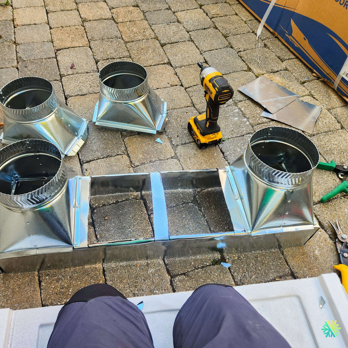 Installation d’une thermopompe gainable GREE All Match Slim Duct R32 à conduits gainables à Chomedey, Laval