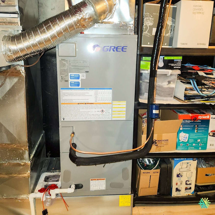 Installation d'un système central GREE UNIX R32 avec fournaise électrique d'appoint intégrée à McMasterville, dans la MRC de La Vallée-du-Richelieu