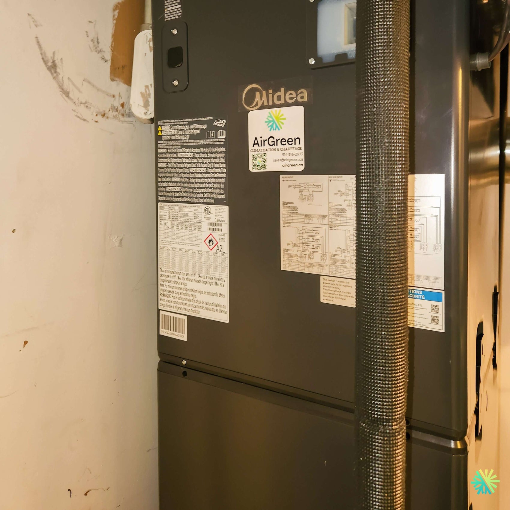 Installation d’une fournaise électrique MIDEA EVOX G3 1.5 tonne avec système central et air handler dans Rosemont–La Petite-Patrie à Montréal