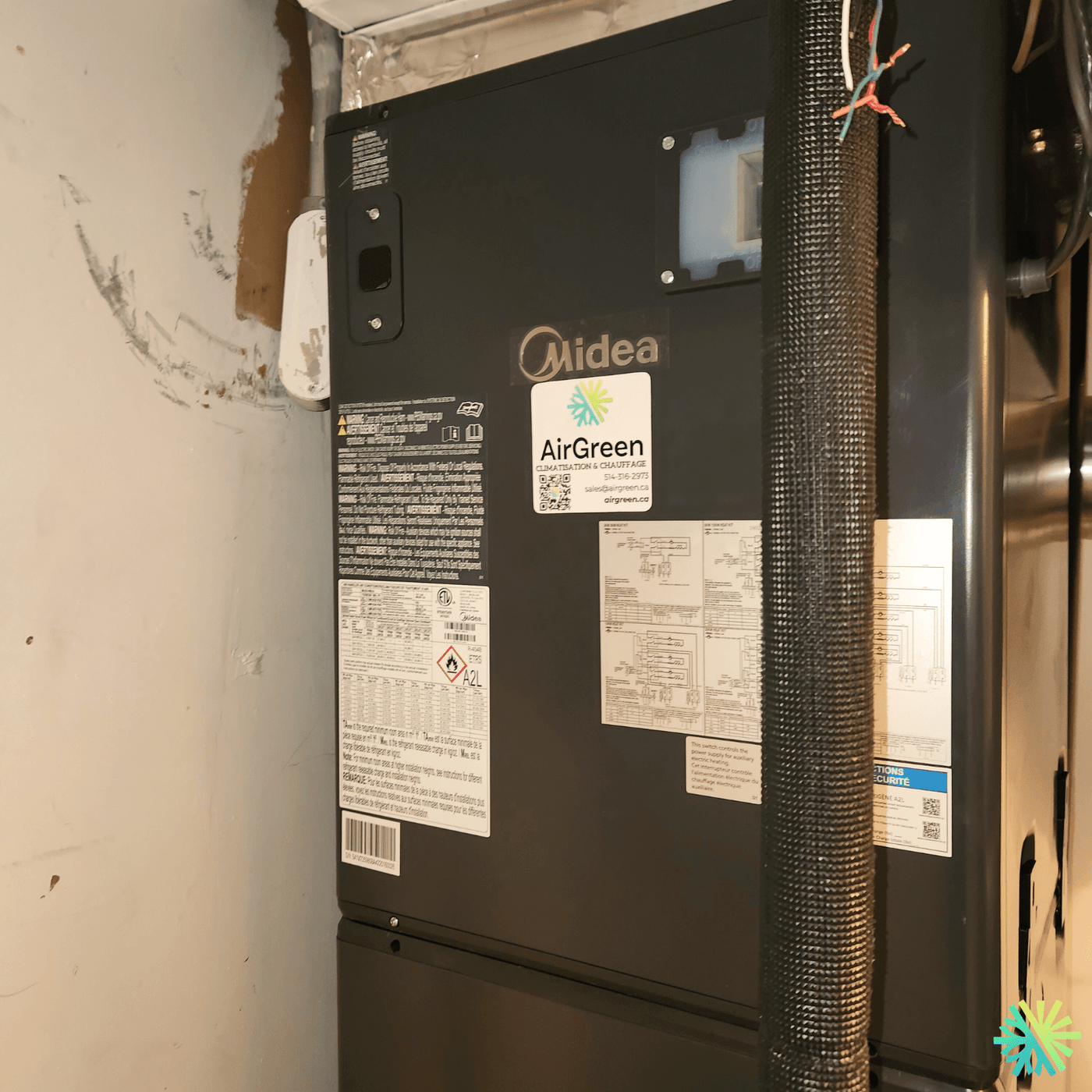 Installation d’une thermopompe centrale Midea à Ville-Marie (Montréal) : confort 4 saisons, efficacité et intégration propre en espace restreint