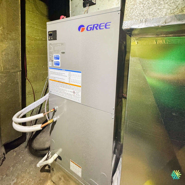 Installation d'un système central GREE FLEXX R32 au sous-sol d'une maison de Lacolle, en remplacement d'une fournaise électrique