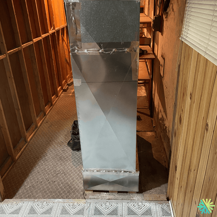 Thermopompe centrale Elios installée à Ahuntsic-Cartierville (Montréal) : plénum neuf, conduits étanchés et confort stable