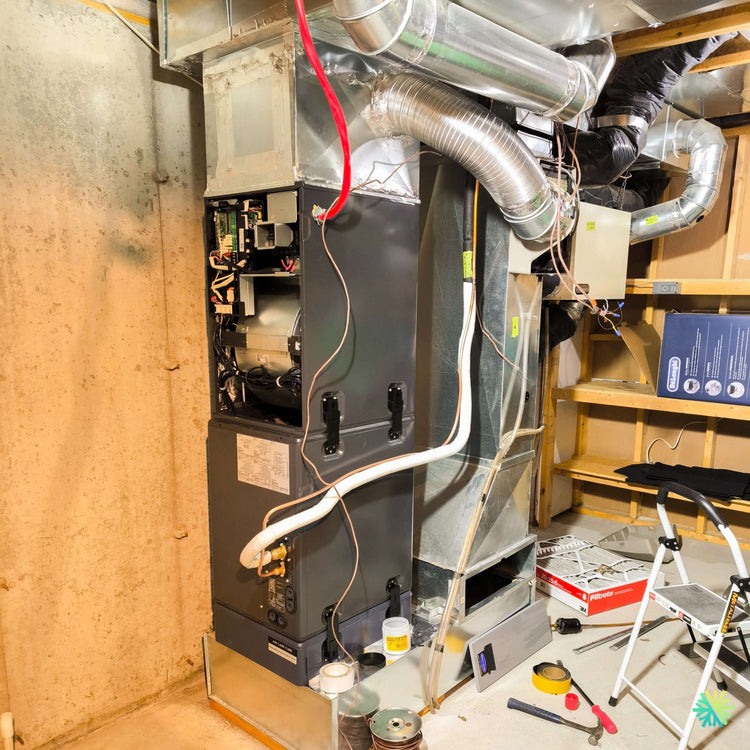 Installation d’une fournaise électrique MIDEA EVOX G3 3 tonnes avec système central à Vaudreuil-Dorion