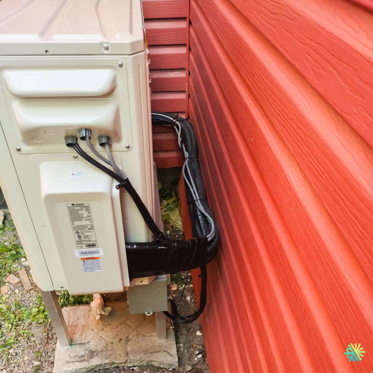 Installation d'une thermopompe 2 têtes GREE FreeMatch R32 à Sainte-Anne-de-Bellevue, à la pointe ouest de l'île de Montréal