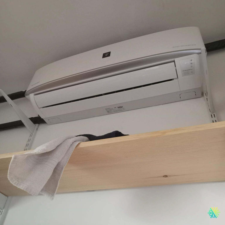 Réparation d’un climatiseur mural Sharp à Sainte-Dorothée